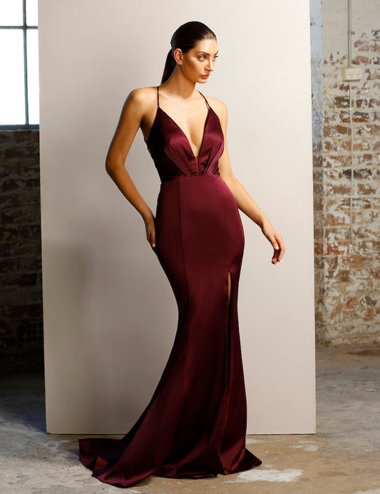 Jadore JX1101 Fitted Satin Evening Gown - An elegant gown featuring a plunging V-neckline with a sheer panel, open back with criss-crossing straps, a high slit, and a train, perfect for any evening occasion.