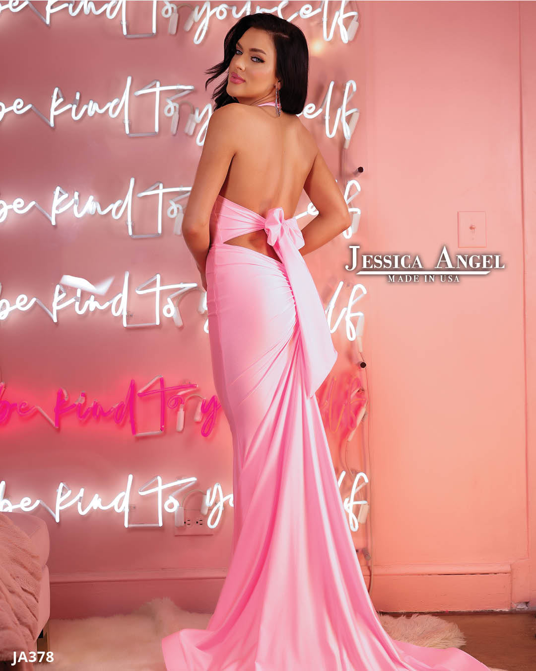 Jessica Angel 378 Halter Neck Gown - Pink jersey gown featuring an open back and center back skirt ruching, perfect for prom or formal evening events.