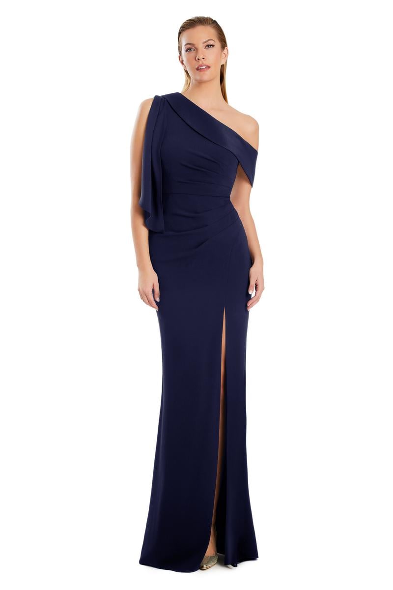 Model wearing Alexander by Daymor 3058S25 one-shoulder draped evening gown with pleated bodice, high side slit, and cascading detail.