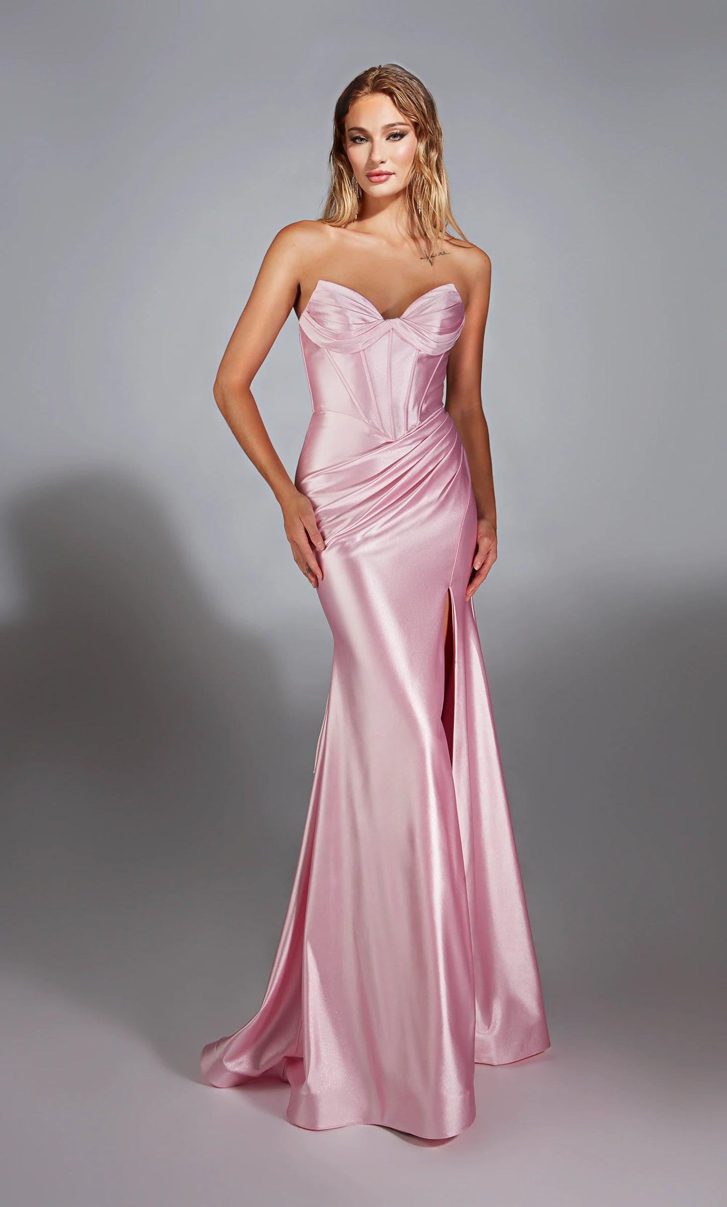 Alyce Paris 61733 Metallic Stretch Satin Strapless Gown with a fit-and-flare silhouette, lace-up back, and high slit.