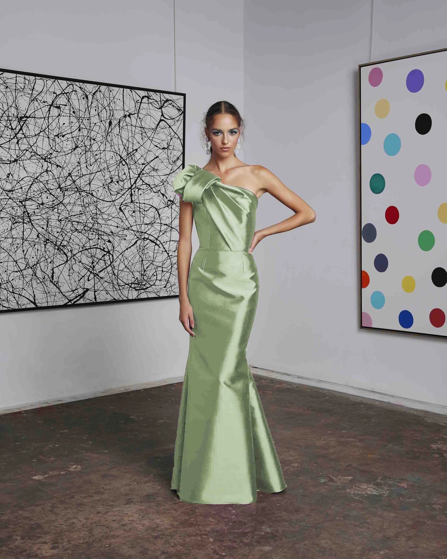 Frascara 4612 - A chic one-shoulder evening gown with an asymmetrical bow detail, perfect for formal evenings and mother of the bride or groom occasions. The model is wearing the dress in mint.