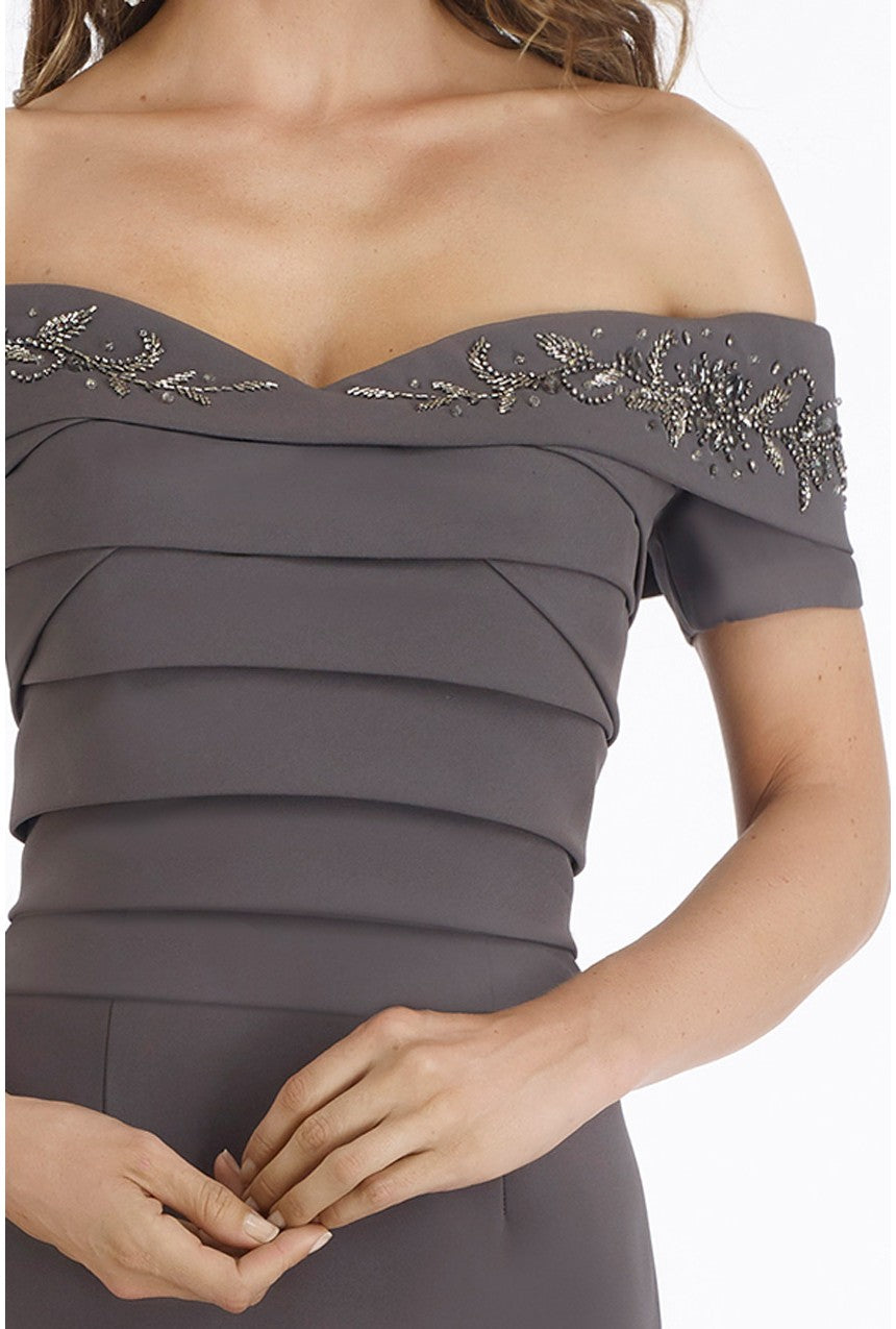 Off-the-shoulder evening dress by Gia Franco with glittering bead embellishments on the bodice. Perfect for evening events and mother of the bride or groom attire.