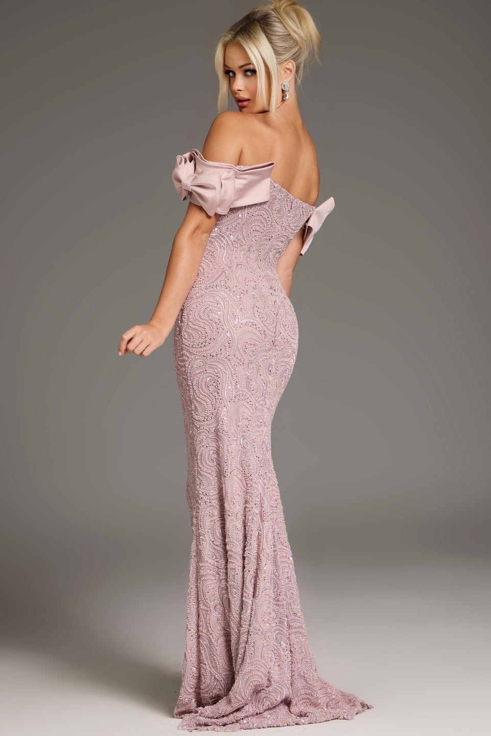 Jovani 38112 Off-the-Shoulder Ruffled Sleeve Evening Gown featuring intricate embellishments and a fitted silhouette for a formal, elegant look.