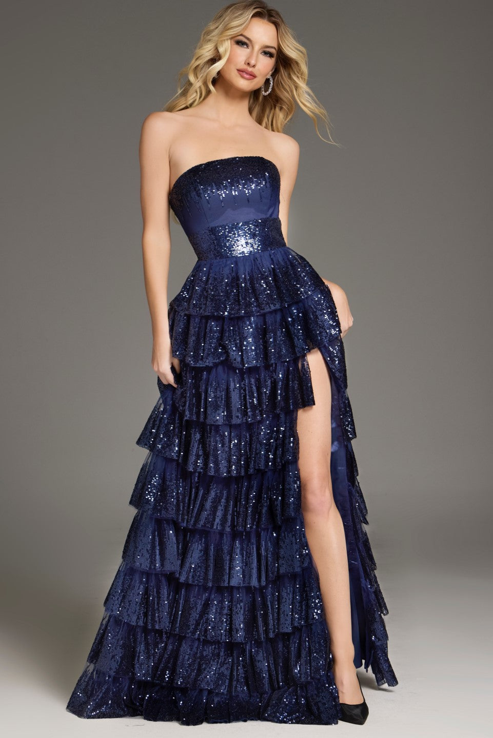Jovani 40199 Strapless Tiered Gown with Sequined Bodice - An elegant A-line gown with a sparkling bodice and dramatic tiered skirt, ideal for formal evening wear and mother of the bride or groom events.