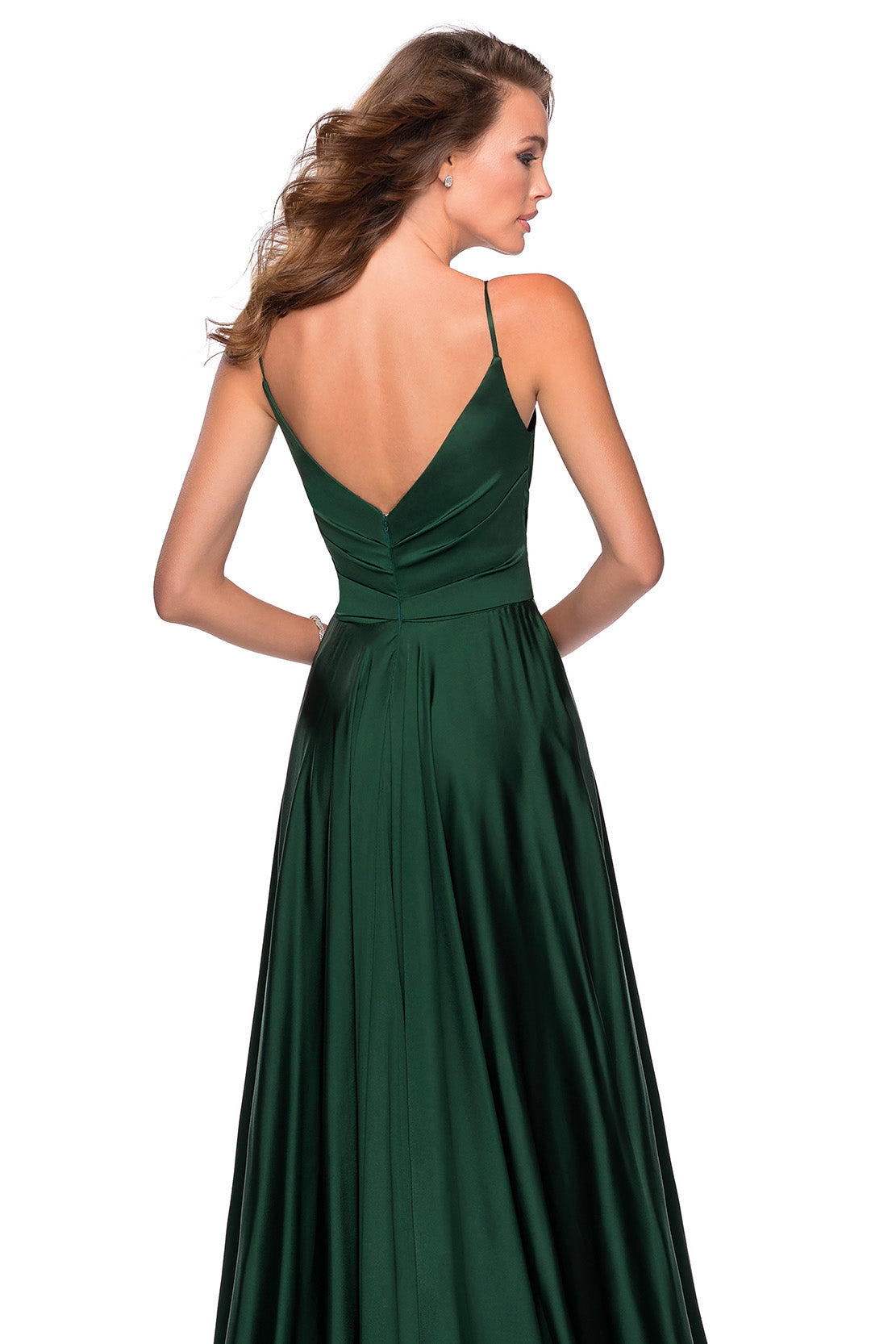La Femme 28607 - An elegant satin A-line gown with a deep V neckline, perfect for a sophisticated and alluring look at prom. The model is wearing the color emerald.