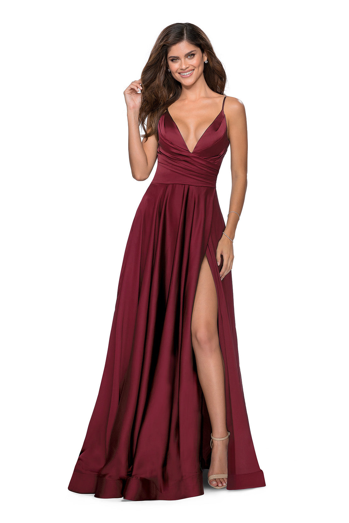 La Femme 28607 - An elegant satin A-line gown with a deep V neckline, perfect for a sophisticated and alluring look at prom. The model is wearing the color wine.