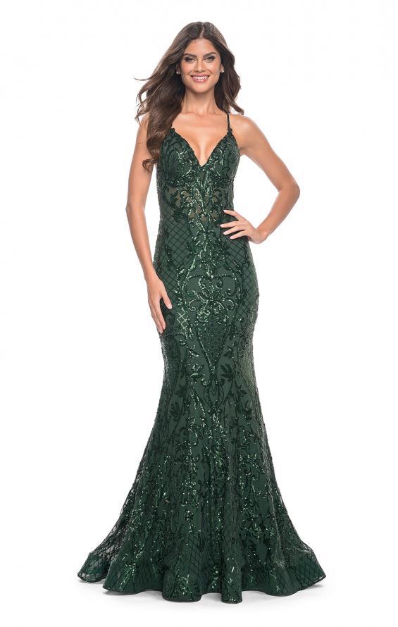 La Femme 31943 Stunning Print Sequin Mermaid Prom Gown - A captivating mermaid gown with a mesmerizing print sequin design, illusion waist, and dramatic open lace-up back. The picture is of the model wearing the dress in emerald.