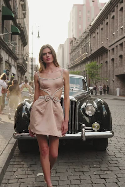 Sherri Hill 56460 Satin Cocktail Dress - A luxurious satin cocktail dress featuring alluring cutouts, bead and bow embellishments, and an open back. Perfect for graduations, pageants, homecoming, and evening events.  This is a video