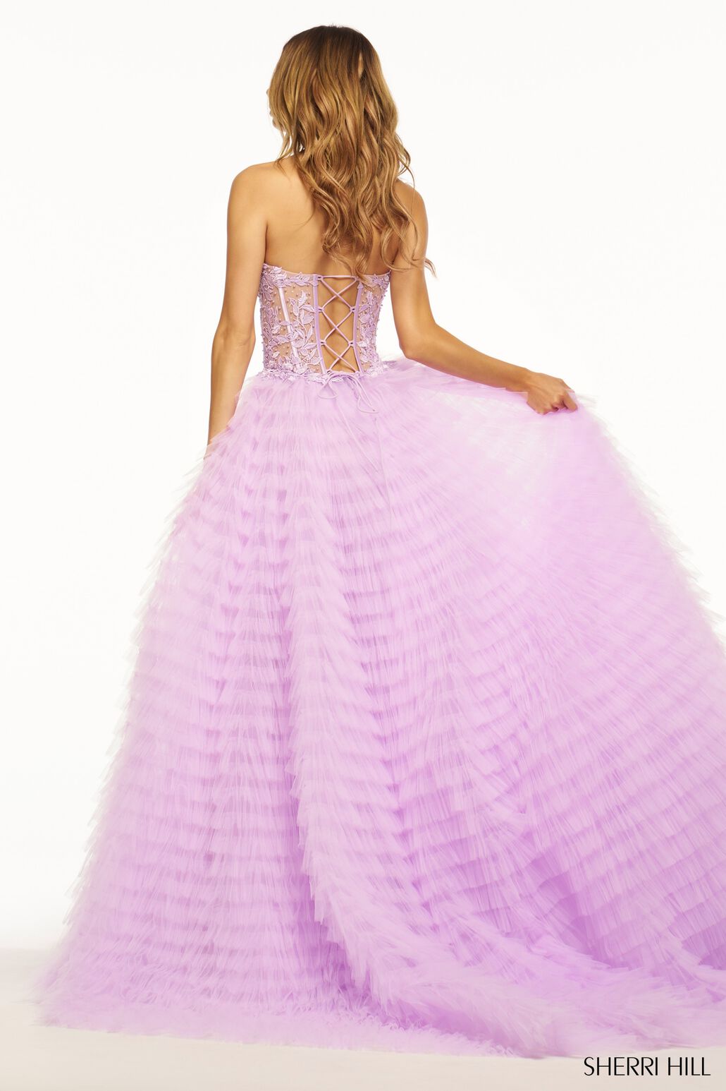 The Sherri Hill Strapless Ballgown with Leaf Lace Corset Bodice, a captivating choice for proms, formal occasions, or a magical quinceañera.