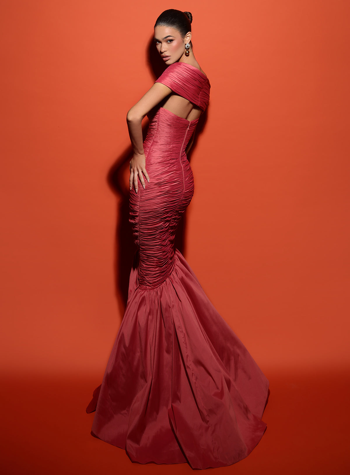 Tarik Ediz 98439: Mesmerizing mermaid dress with exquisite ruching, off-the-shoulder neckline, and dazzling beadwork embellishment.