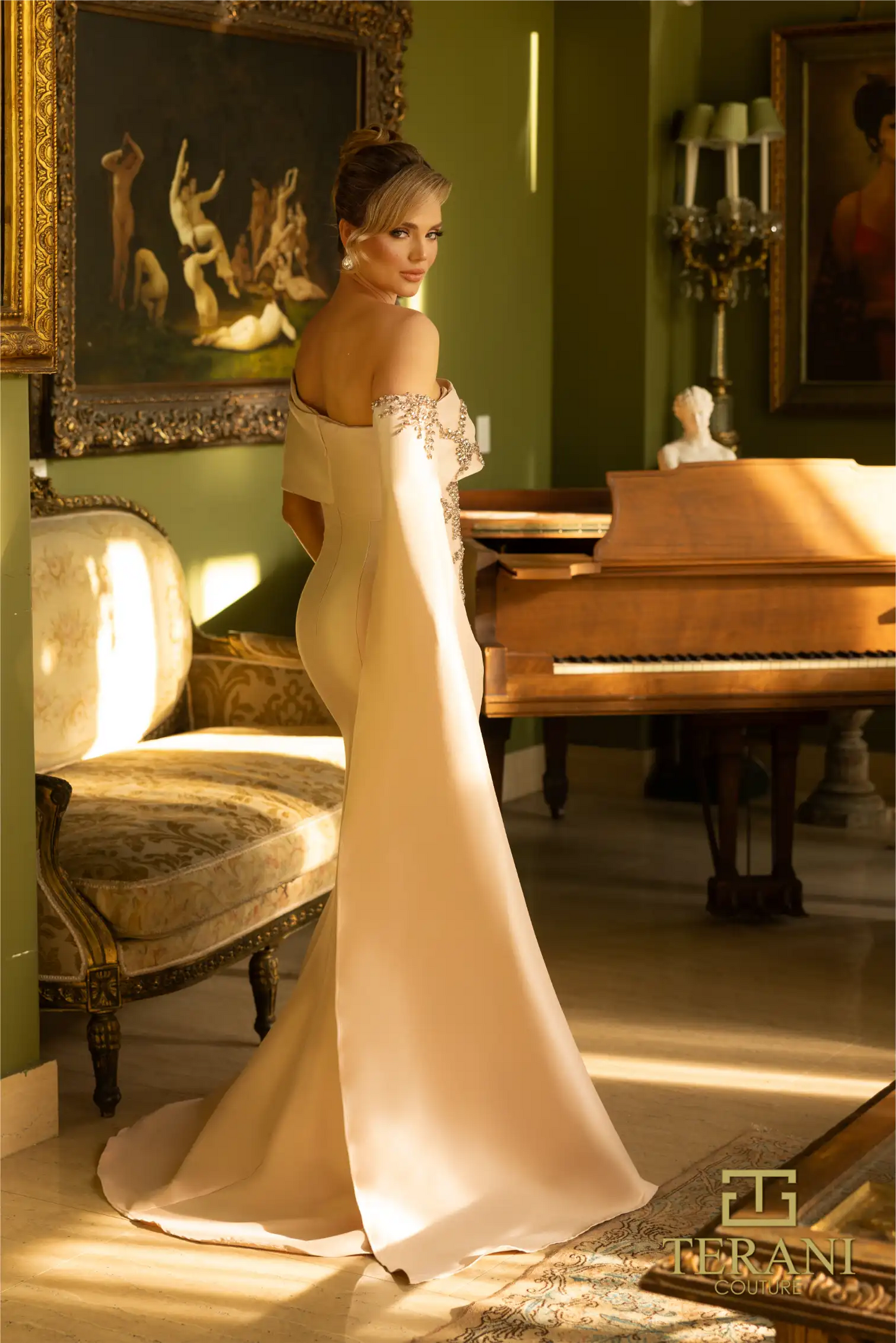 Terani 242M3311 One Shoulder Front Slit Trumpet Dress - Elegant gown featuring a one-shoulder design, front slit, and trumpet silhouette in Stretch Mikado fabric with intricate embellishments. Model is wearing blush.