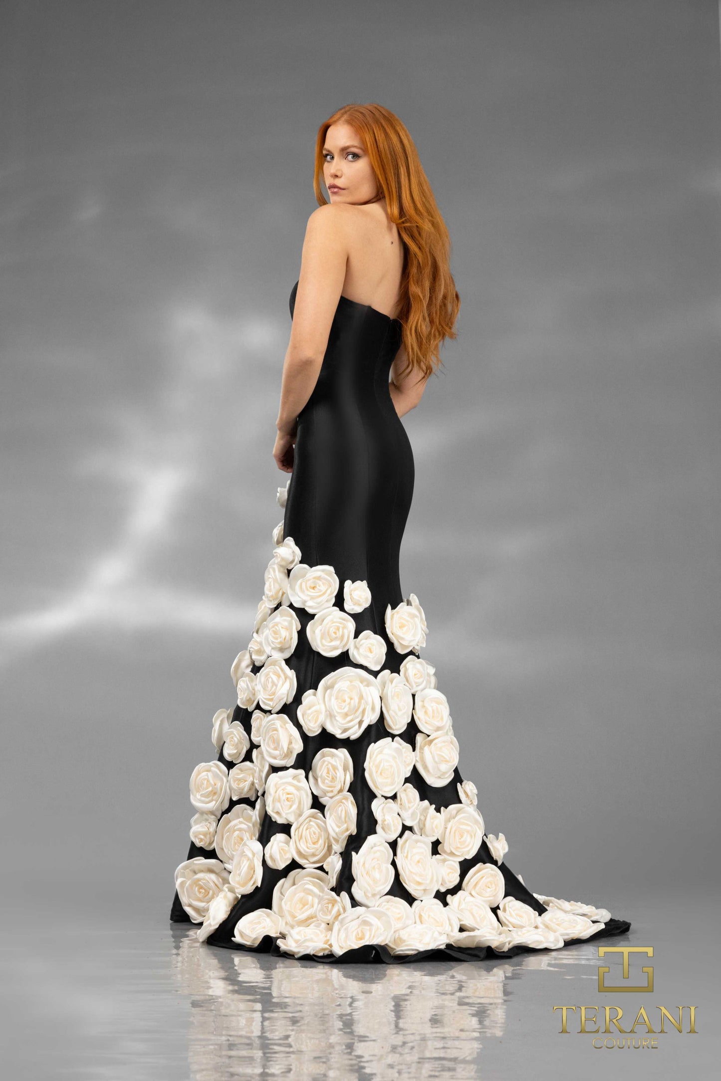 Terani Couture 251GL4184 Stretch Mikado Trumpet Gown with 3D floral appliqués, strapless bodice, and detachable sheer cape.
