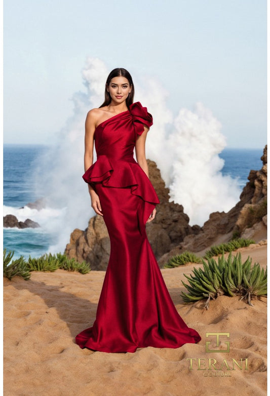 Model wearing Terani Couture 252E5546 fit and flare gown with one-shoulder design and peplum detail, ideal for formal evening or Mother of the Bride occasions.