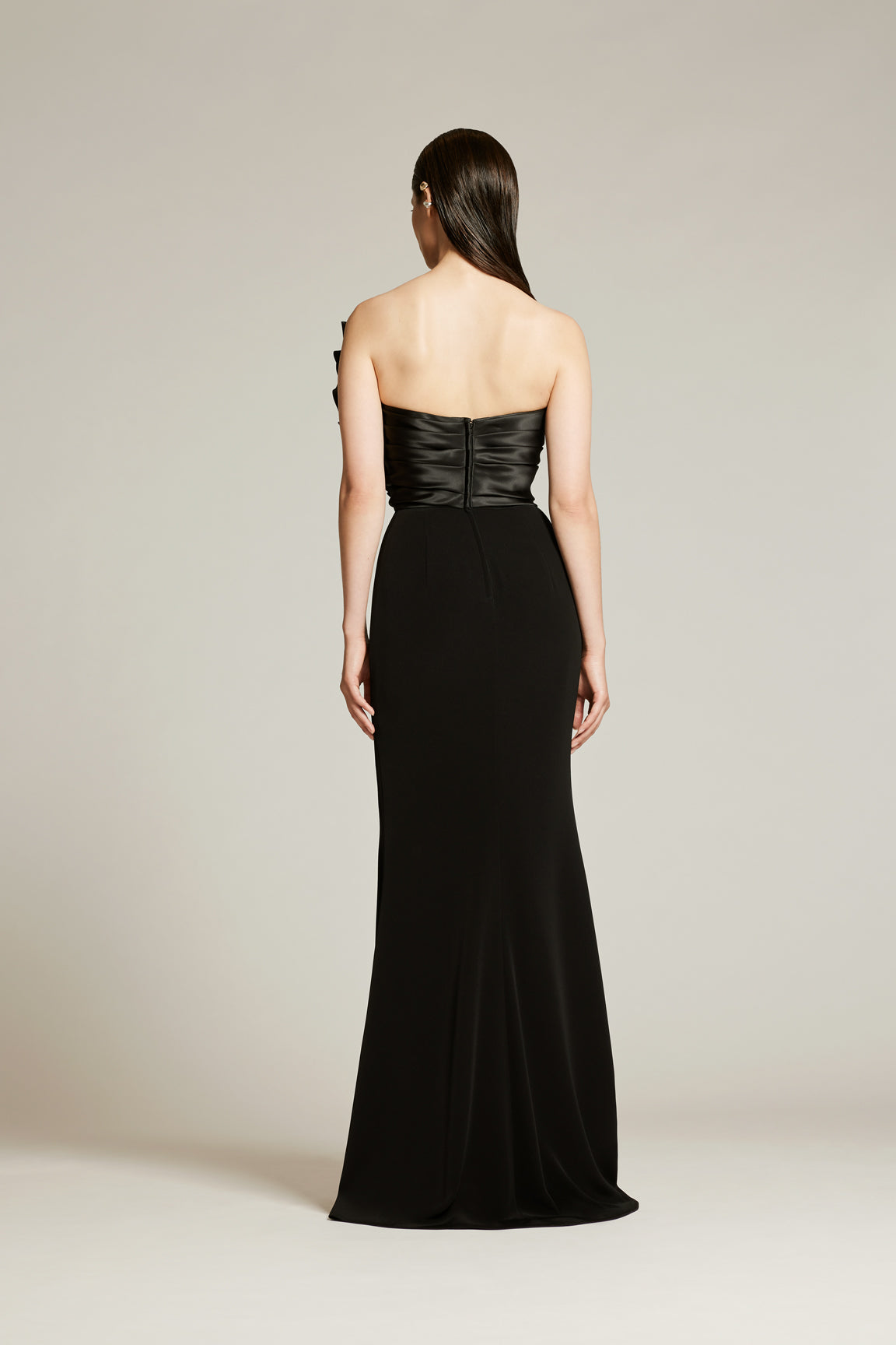Audrey+Brooks 6403 one shoulder gown with sculptural pleated bodice, crystal shoulder embellishment and front slit.  Back View