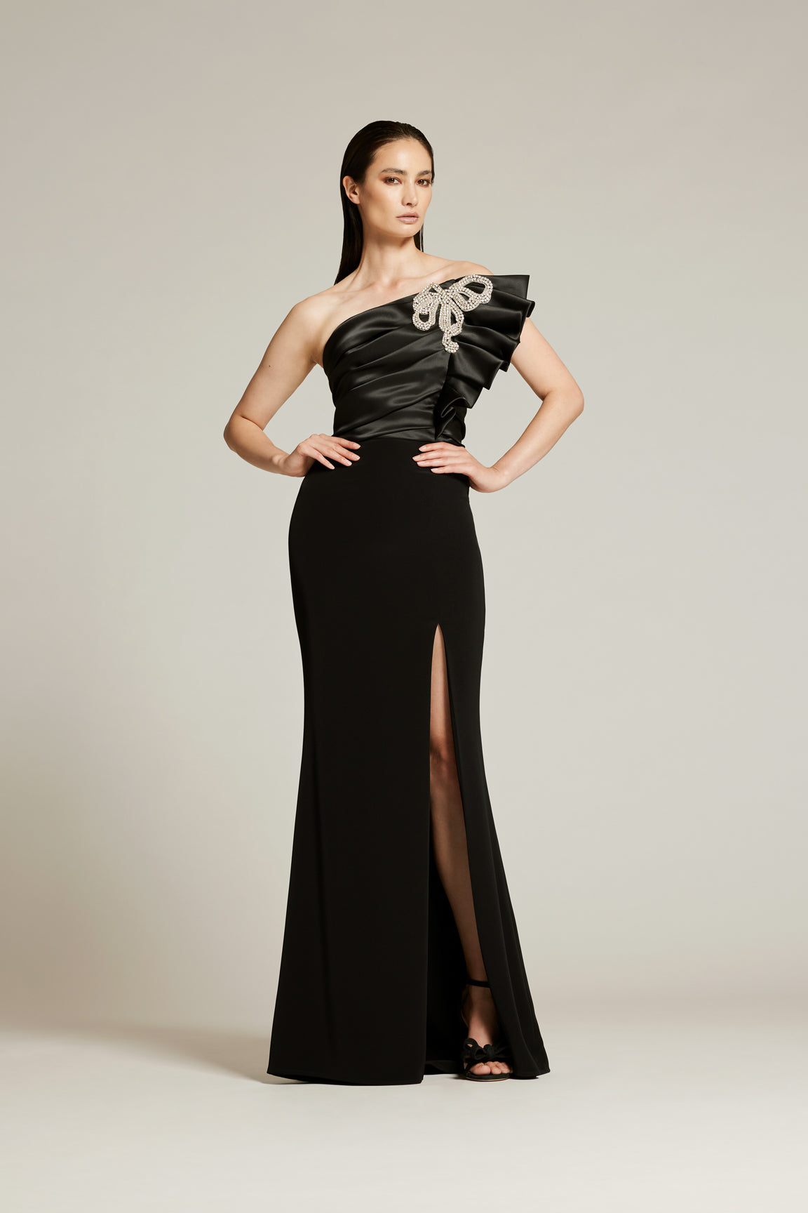 Audrey+Brooks 6403 one shoulder gown with sculptural pleated bodice, crystal shoulder embellishment and front slit.