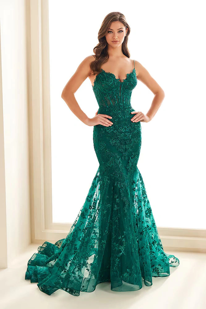 Ellie Wilde EW36008 Corset Bodice Gown in light yellow with lace-up back and glitter tulle details. Perfect for prom.  Model is wearing the dress in the color emerald.