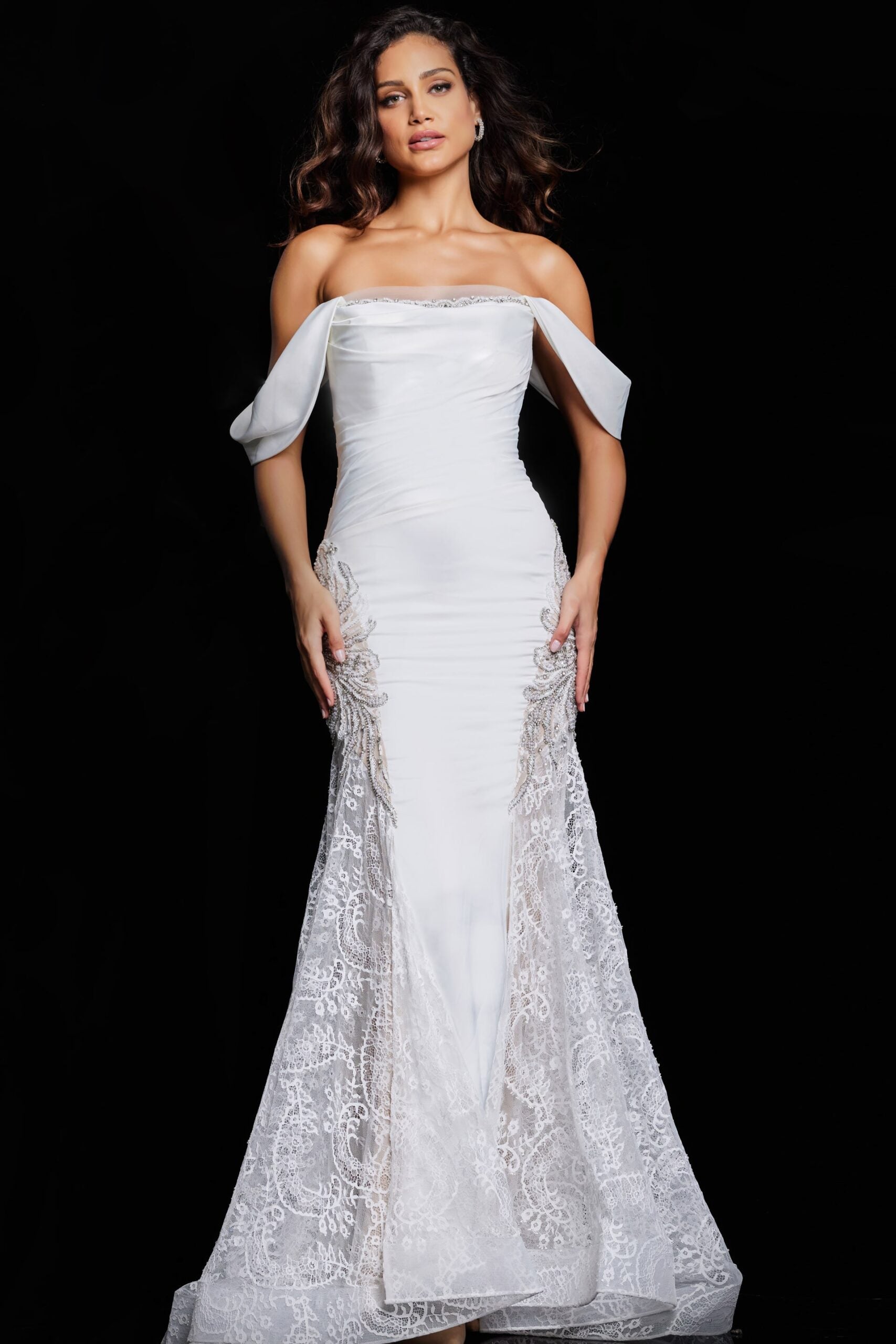 Jovani 38501 Off-Shoulder Evening Gown with Lace Appliqué - Ivory gown featuring draped sleeves, lace embellishments, and a floor-length train.