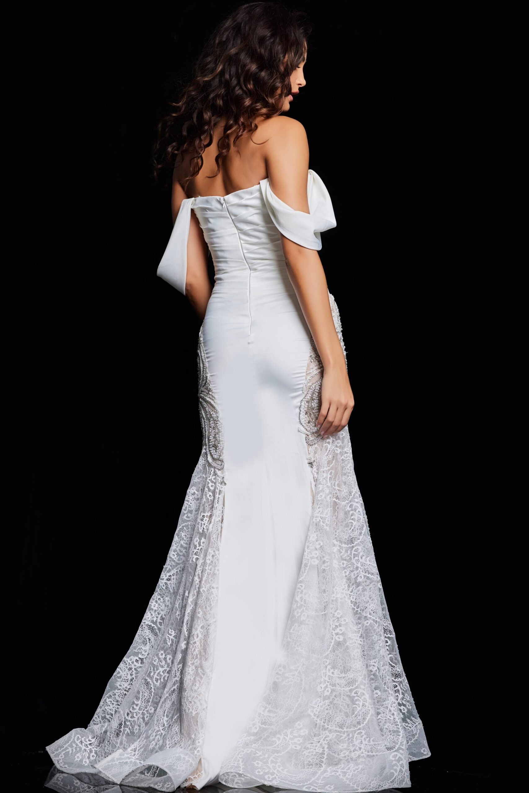 Jovani 38501 Off-Shoulder Evening Gown with Lace Appliqué - Ivory gown featuring draped sleeves, lace embellishments, and a floor-length train.