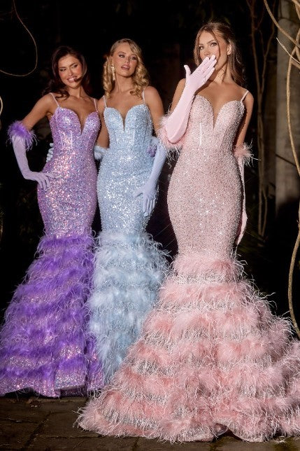 The Portia & Scarlett Sequin and Pearl Mermaid Gown with Tiered Feathered Hem, a statement of elegance and sophistication for proms, formal events, and red carpet affairs.