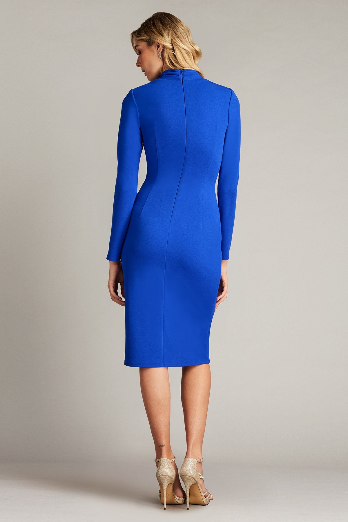 Tadashi Shoji BOS23357M Long-Sleeve Flounce Dress – Mystic blue formal dress featuring a draped wrap effect and cascading flounce detail.
