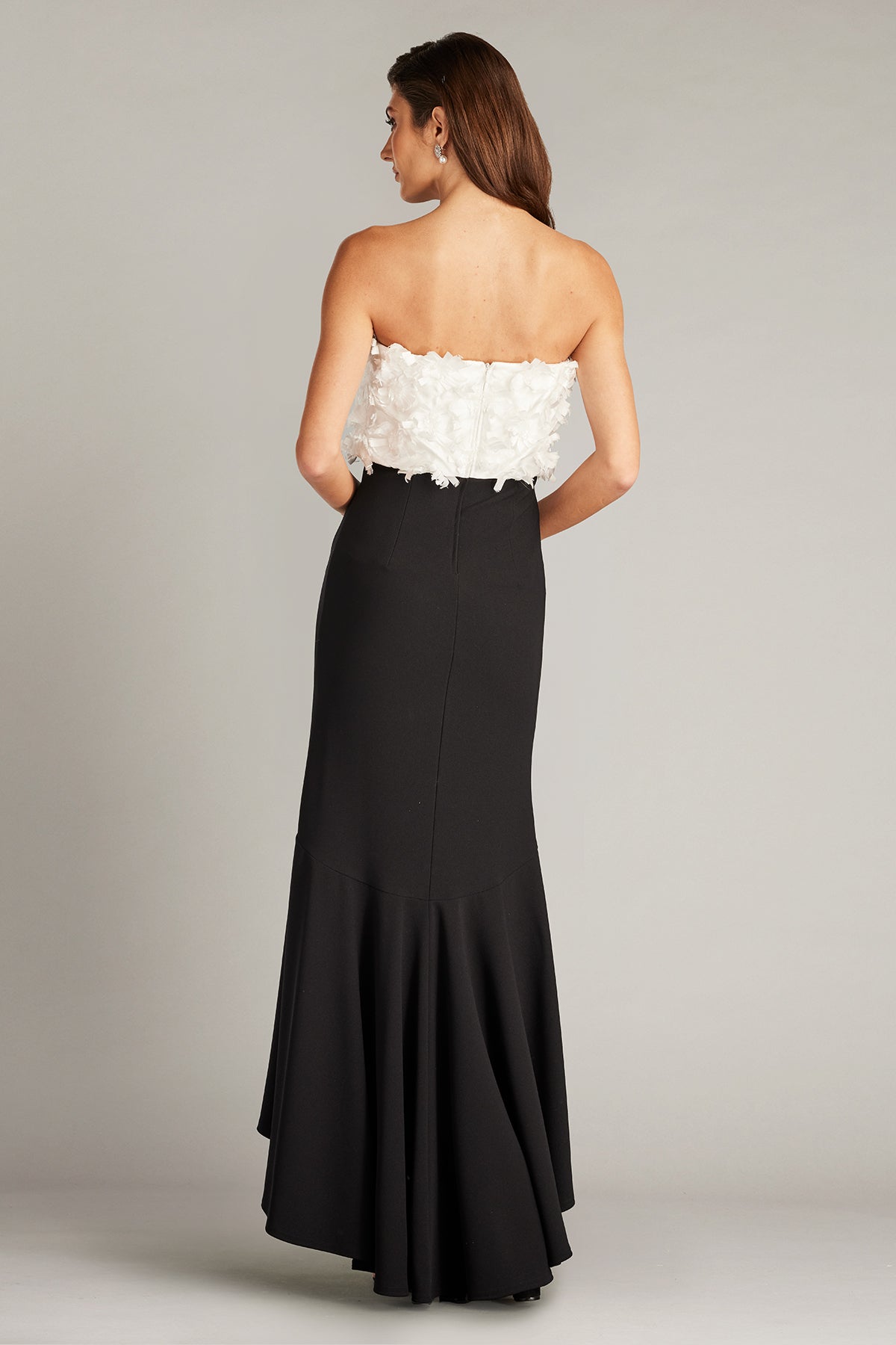Tadashi Shoji CCE23423MDX Floral Embellished Strapless Gown - A sophisticated black and white gown featuring a floral-adorned strapless bodice, ideal for evening events.