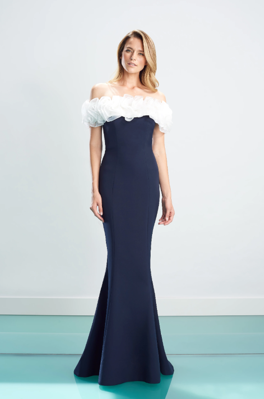 Alexander by Daymor 1461 Navy White Off-Shoulder Evening Gown - A stunning gown with an off-shoulder neckline, white ruffles, fitted bodice, and floor-length skirt with a subtle train.
