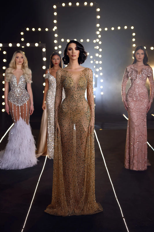 Chic & Holland HF110165 Long-Sleeve Embellished Evening Gown featuring intricate beadwork, illusion neckline, long sleeves, and a dramatic train for formal events.