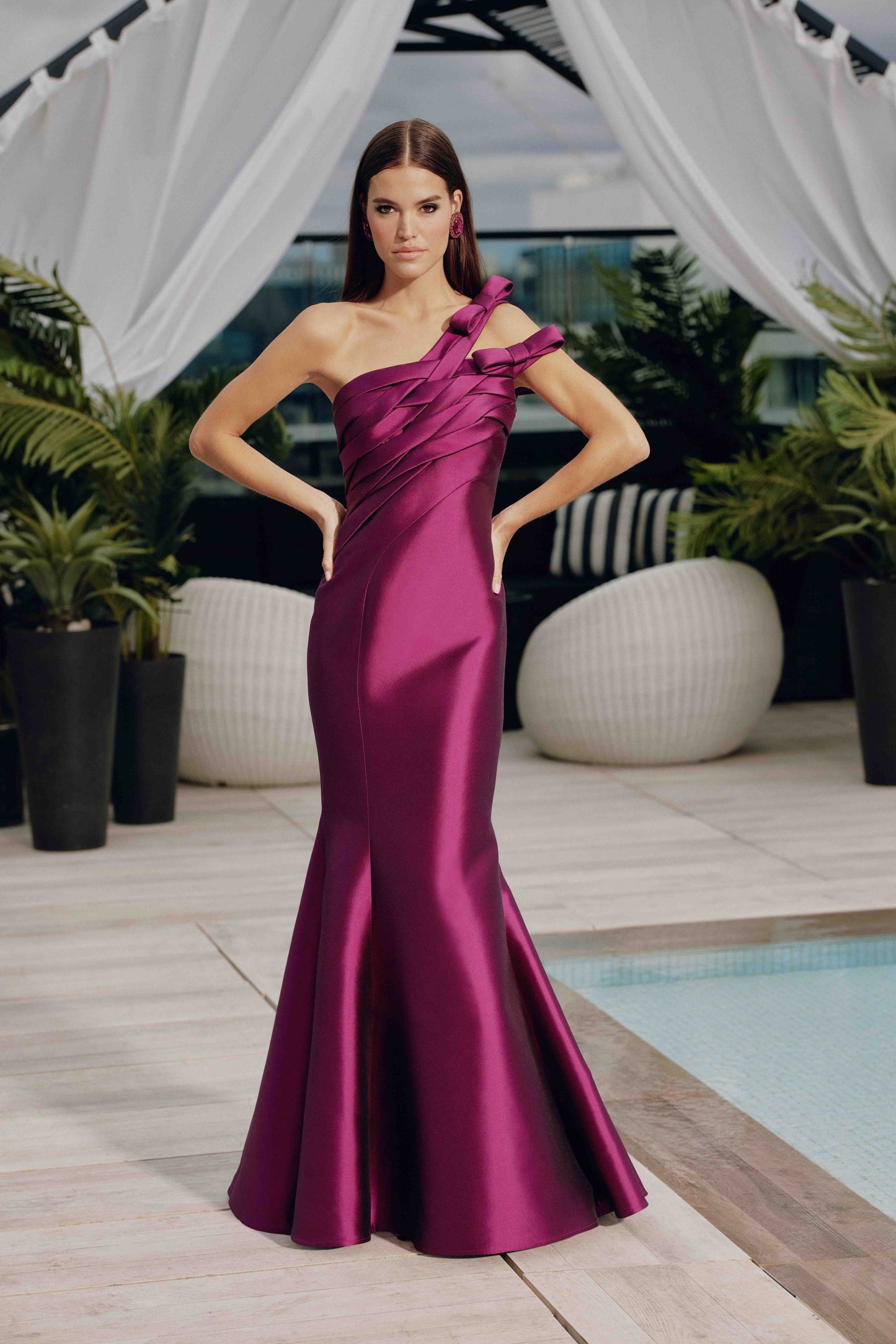 Frascara 4811 off-the-shoulder evening gown with sculpted draped bands, bow accents, and fit and flare silhouette.  Front View.