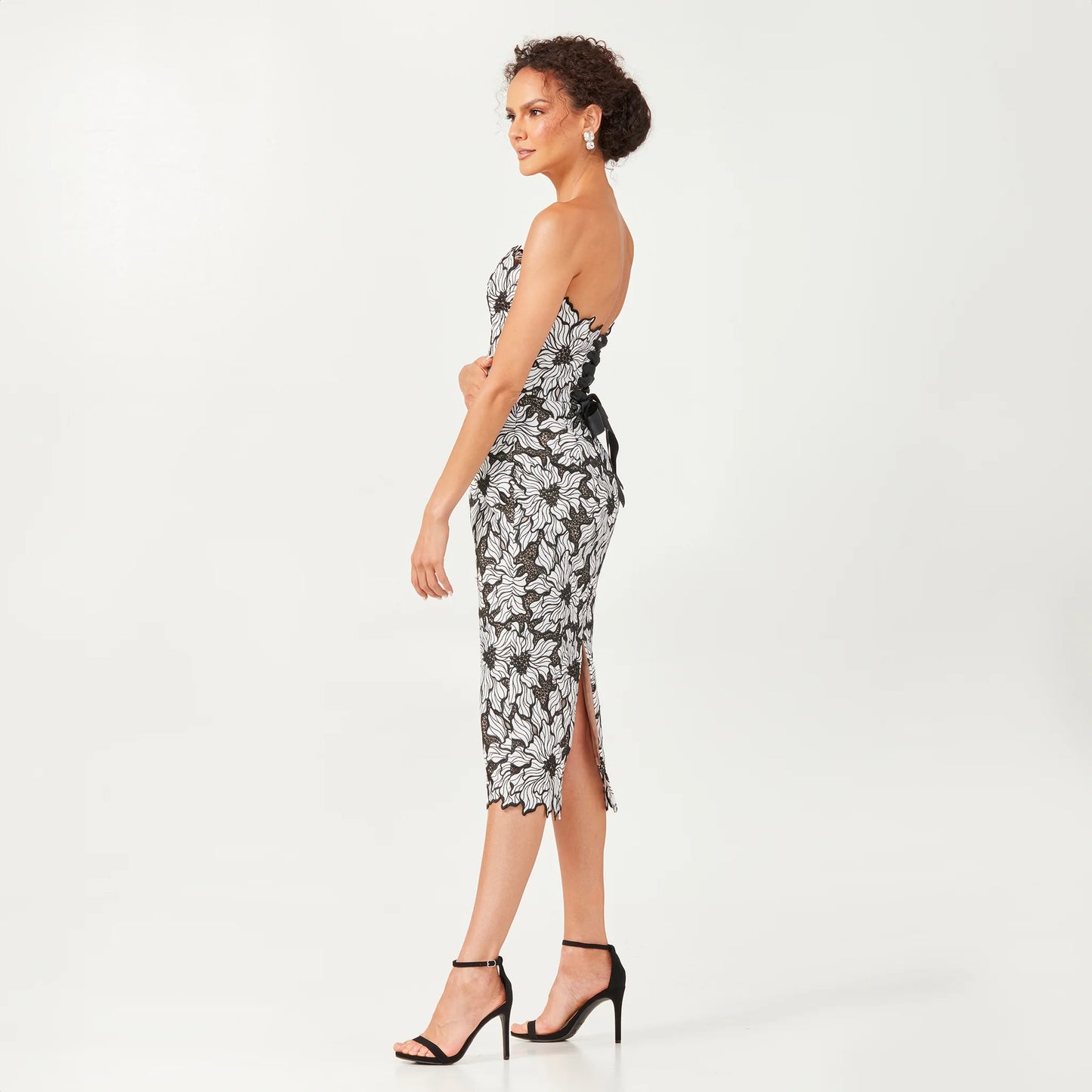 Helsi CECILIA DR6221 Strapless 3D Floral Midi Dress - A strapless midi dress featuring 3D floral appliques, a fitted silhouette, and a lace-up bodice with grosgrain ribbon, perfect for evening formal events and red carpet occasions.