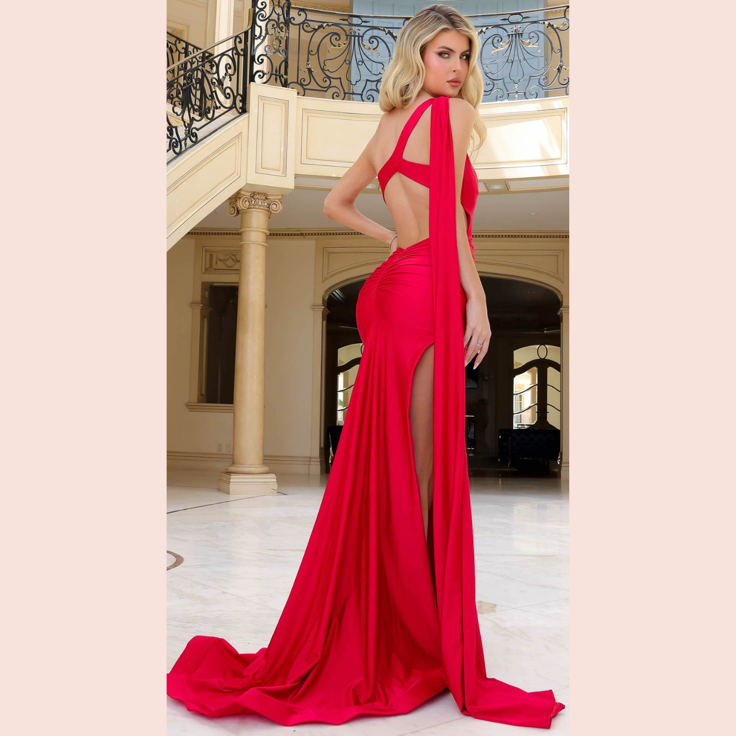 Jessica Angel 2418 Jersey Evening Gown - Sleek dress featuring center-back skirt ruching, open back, and high slit, ideal for evening events and prom.  Back View.