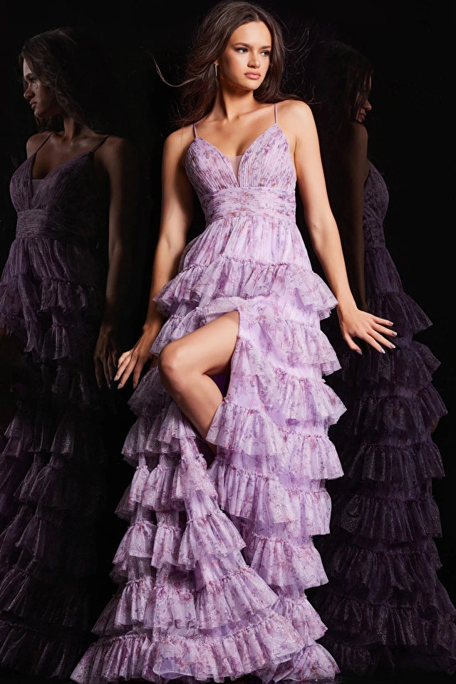 The Jovani Floral Print A-line Gown, a captivating ensemble with a pleated bodice, V-neckline, and a playful ruffle skirt, perfect for proms and formal occasions.  This a picture of the dress in lilac..