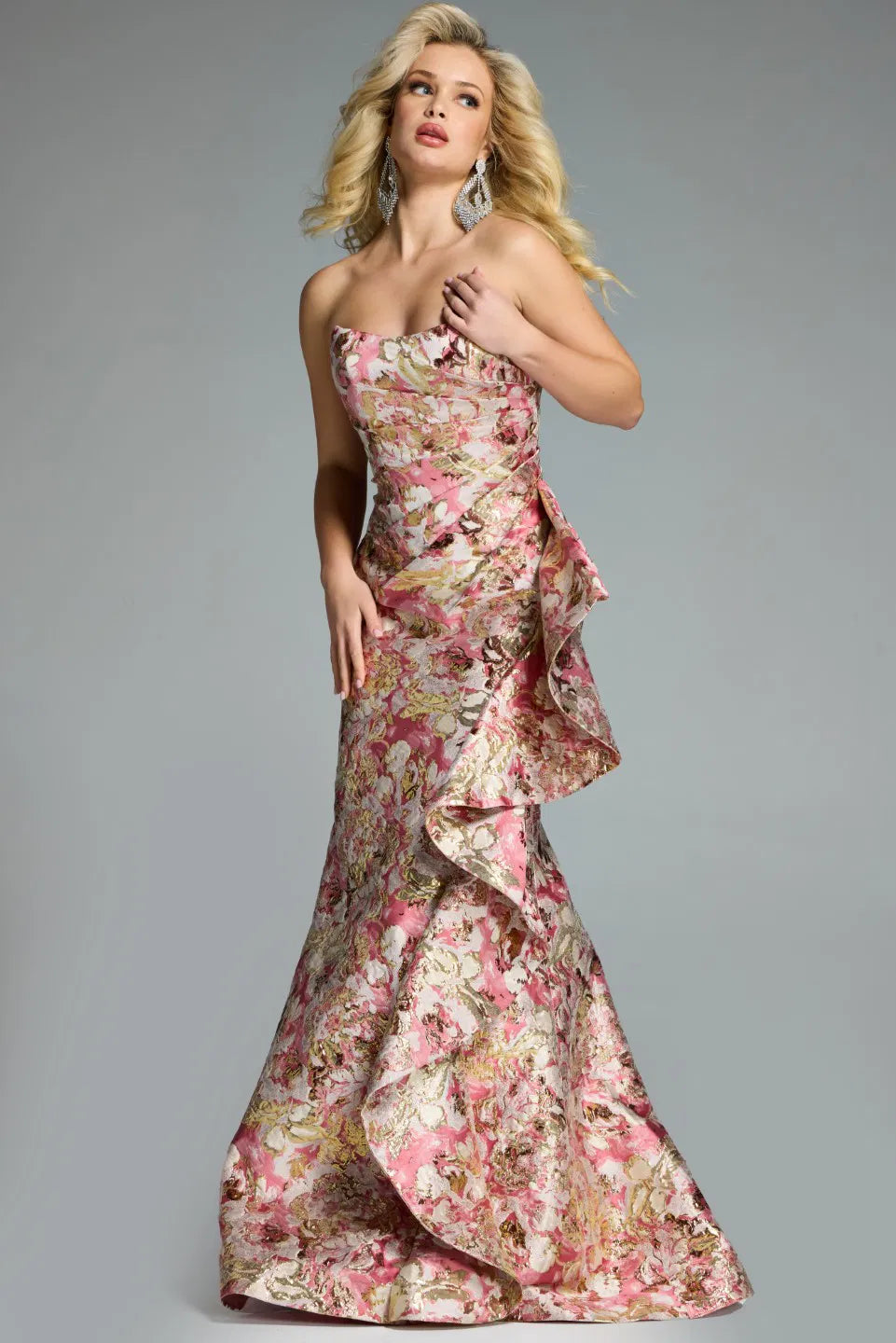 Jovani 42927 strapless jacquard mermaid gown with metallic floral patterns and a draped ruffle detail.