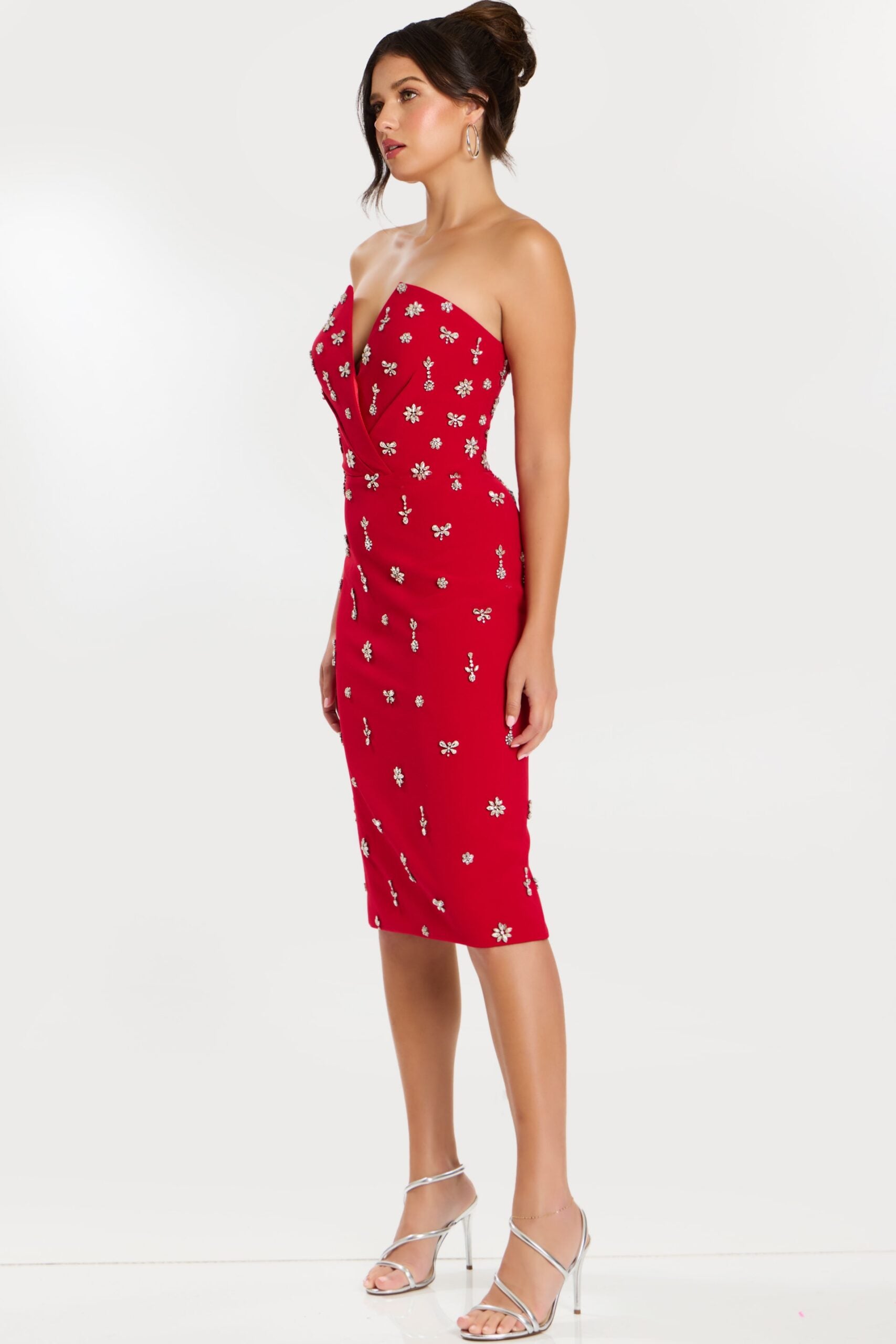 Model wearing Jovani 45249 strapless cocktail dress with intricate embellishments and fitted knee-length silhouette.