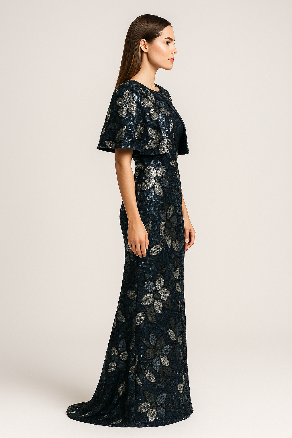 Model wearing Jovani 46431 two-piece column gown with sequin floral detailing, shown strapless and with matching jacket/bolero.  Side View.
