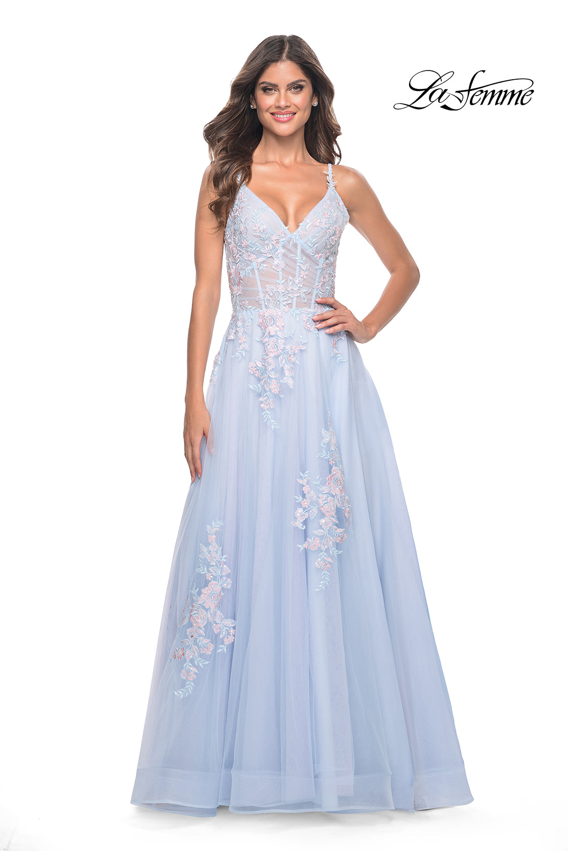 La Femme 31939 Scattered Lace Applique A-Line Prom Gown - An enchanting A-line gown featuring two-color scattered lace applique on tulle, with an illusion waist and boning detail for a magical and captivating prom look.  Model is wearing the dress in the color light blue.