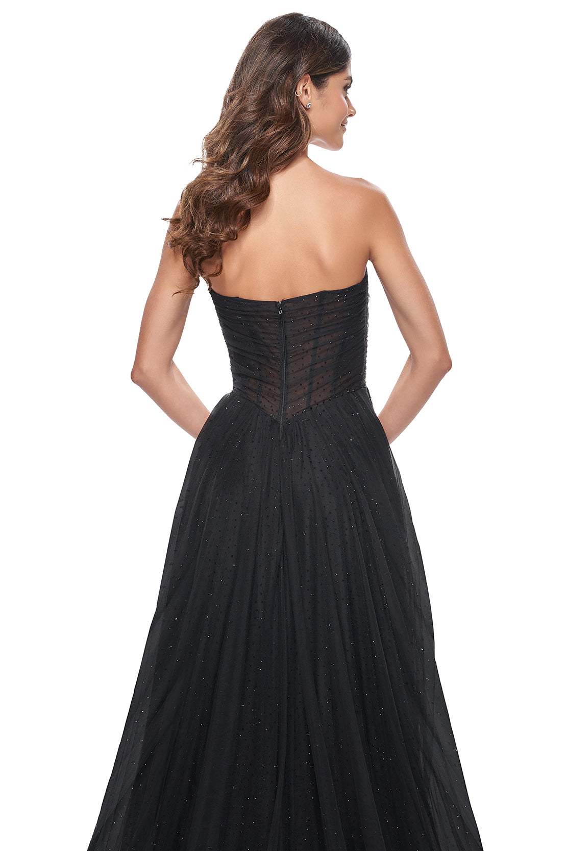 La Femme 32029 Rhinestone Embellished Tulle Gown with High Slit - A glamorous tulle gown adorned with intricate rhinestones, featuring an illusion waist with boning, a strapless bodice, and a captivating high slit. Ideal for proms and formal evening events.