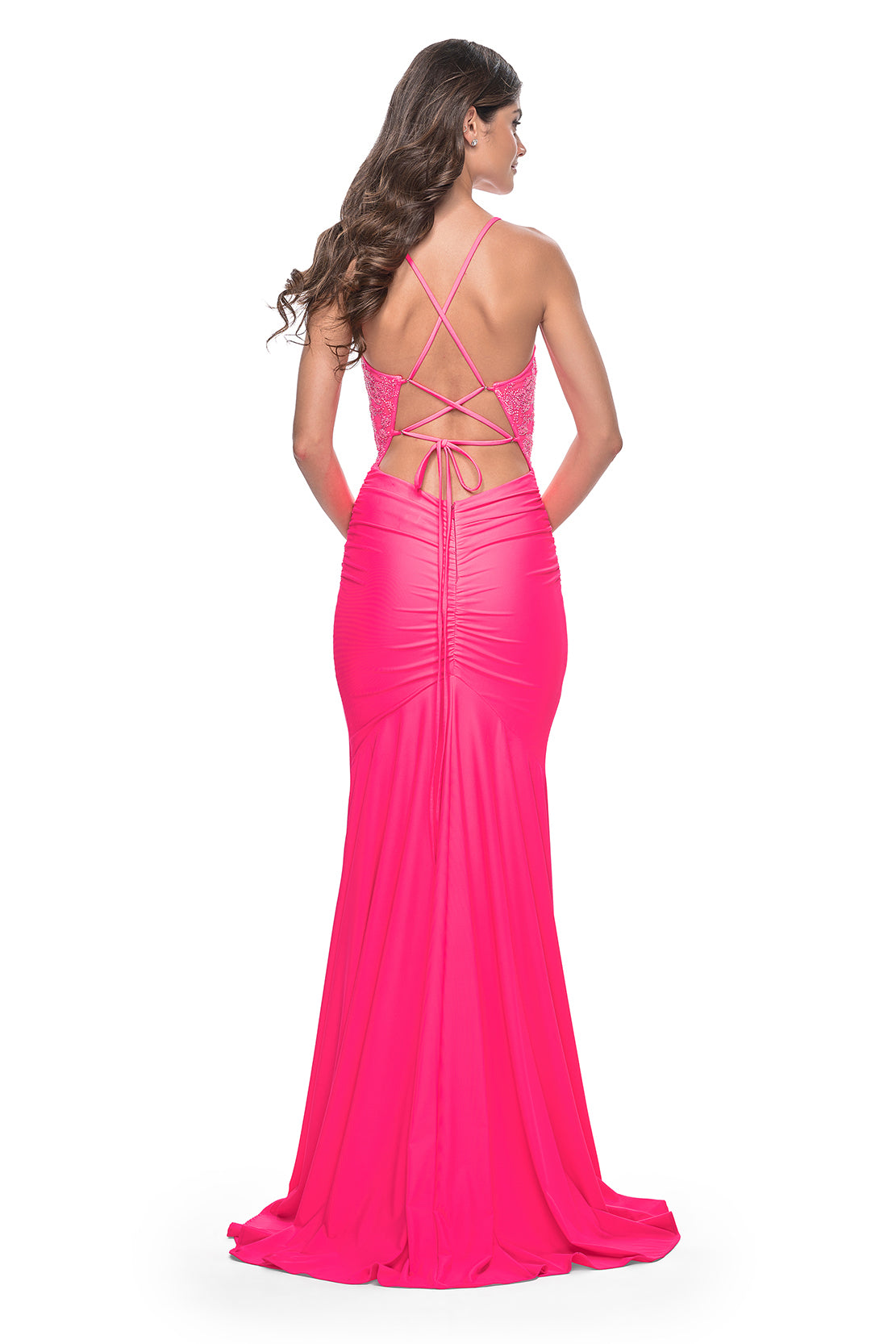 La Femme 32054 - Elegant jersey ruched prom dress with a slit, lace-up adjustable back, and intricate rhinestone beaded bodice for a glamorous and sophisticated look.