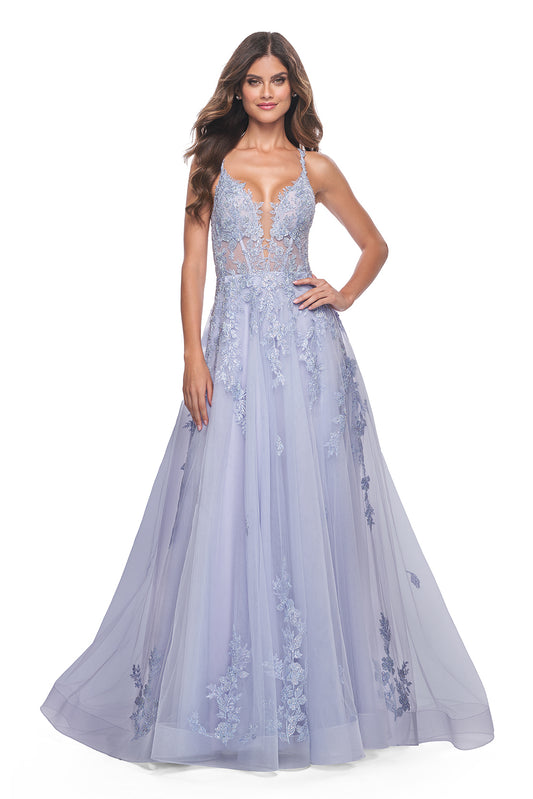 La Femme 32062 A-Line Lace Applique Prom Gown - An enchanting A-line gown featuring a deep v-neck, high slit, lace applique embellished bodice, lace detailed hem, and a charming tie-up back. Perfect for prom or a quinceañera.  Model is wearing Light Periwinkle.