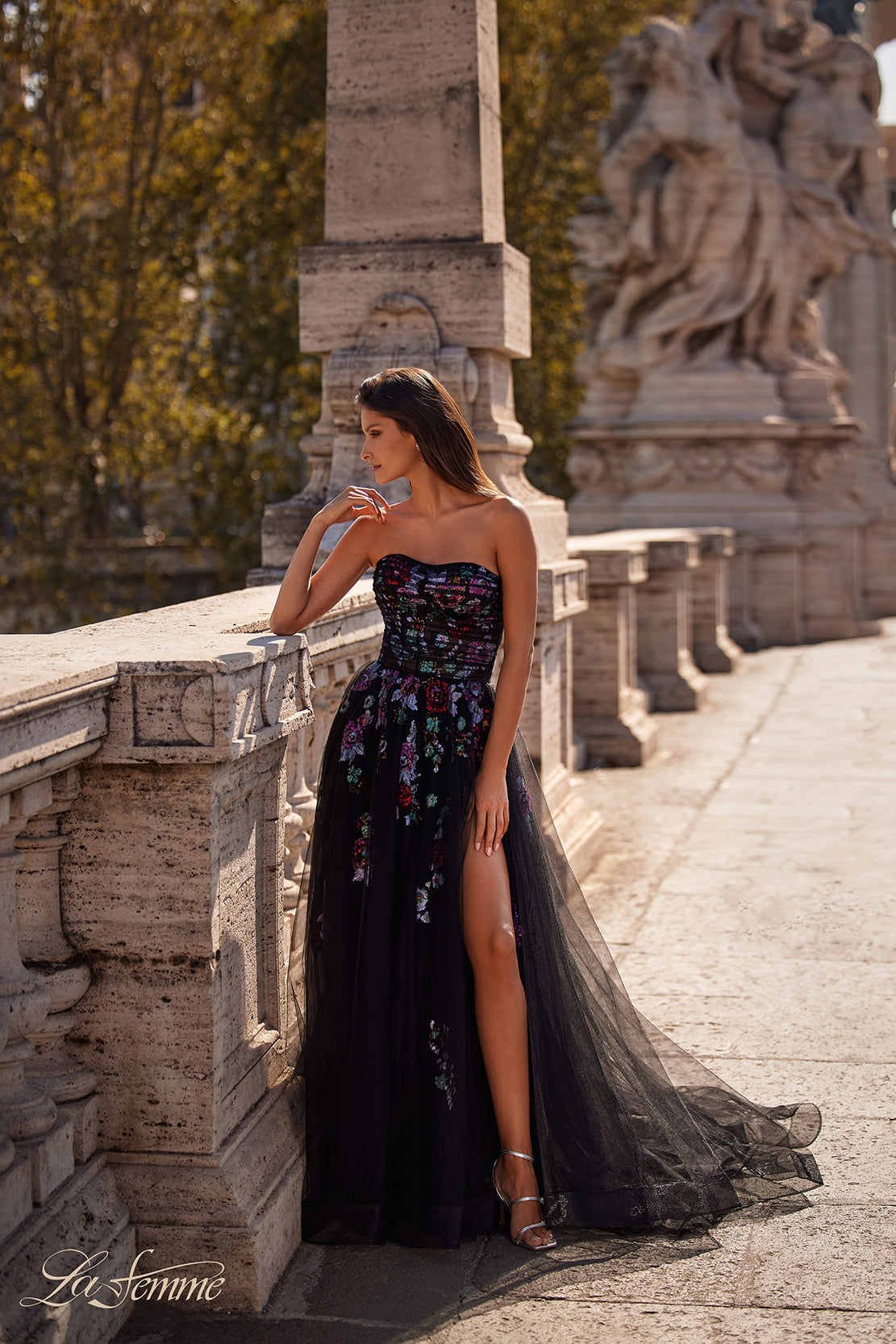 La Femme 32072 Strapless Multi-Color Lace Evening Gown - A stunning A-line gown with multi-color lace floral embellishment, a layer of tulle over the print, and an illusion bodice with exposed boning for a vibrant and stylish look.