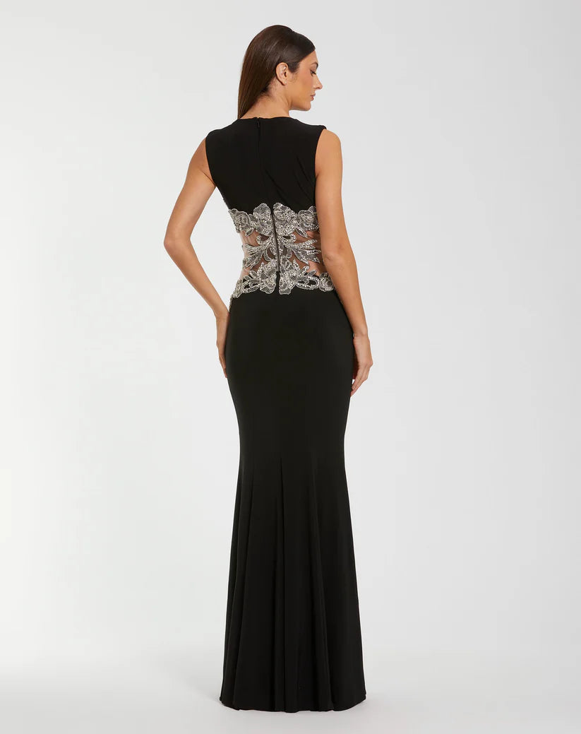 Model wearing Mac Duggal 2324 sleeveless jersey gown with beaded illusion waist detail.