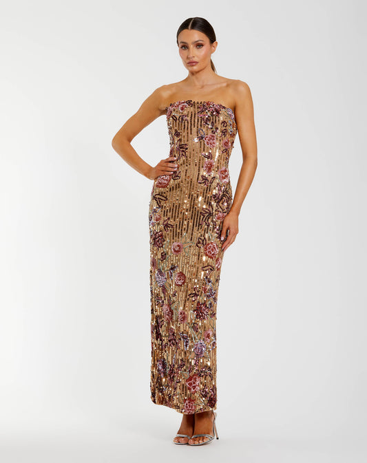 Model wearing Mac Duggal 6193 strapless floral sequin column dress with back slit and allover sequin embellishments.  Front view.