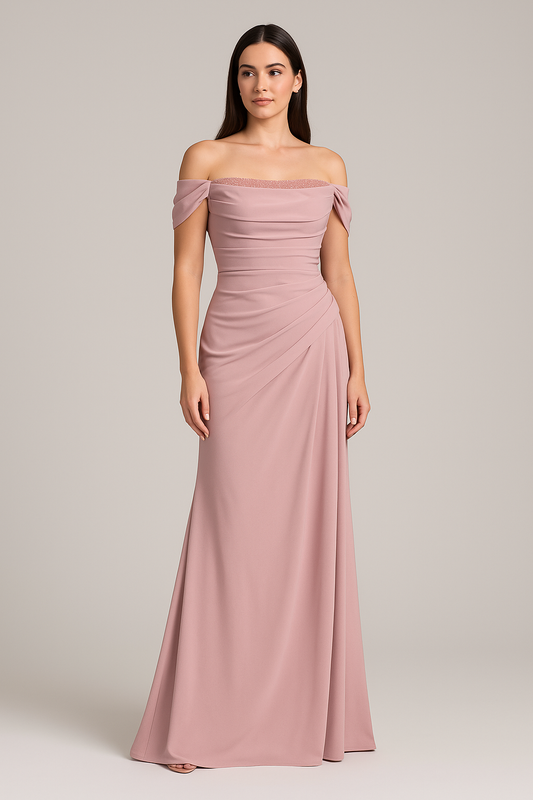Model wearing Madeline’s Catherine off-shoulder beaded gown with ruched bodice and floor-length skirt.  Model is wearing the dress in the color pink.  Front view.