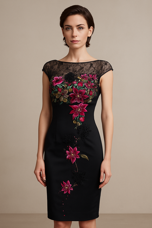 Model wearing Mandalay C80714DEB cocktail dress with embroidered floral detailing, illusion neckline, and V-back design.
