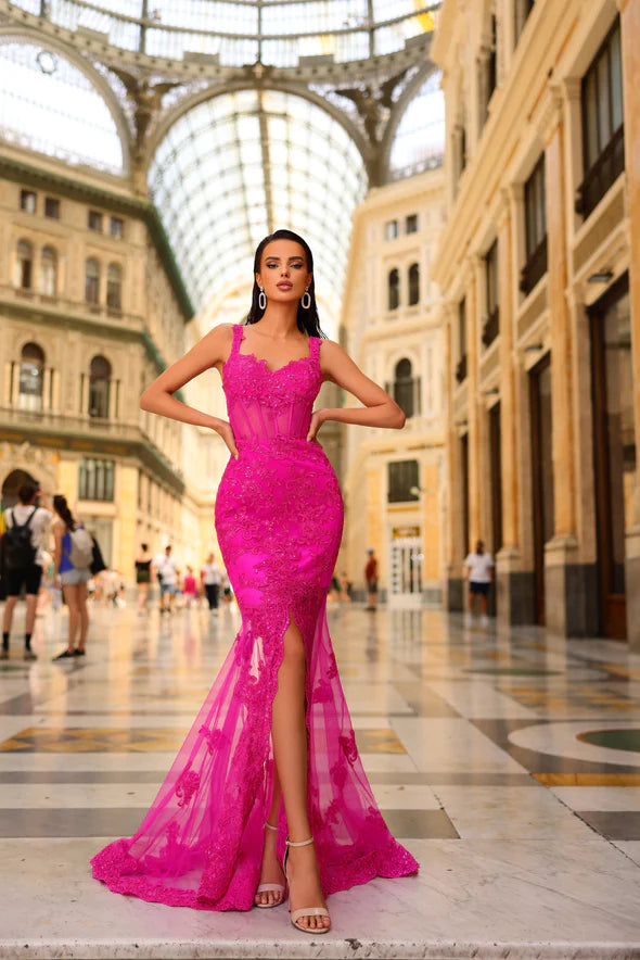 Nicoletta NC1031 Sequin and Lace Embroidered Evening Gown - A stunning evening gown featuring a fitted silhouette, sheer train and bodice with intricate sequin and lace embroidery, and an open lace-up back.