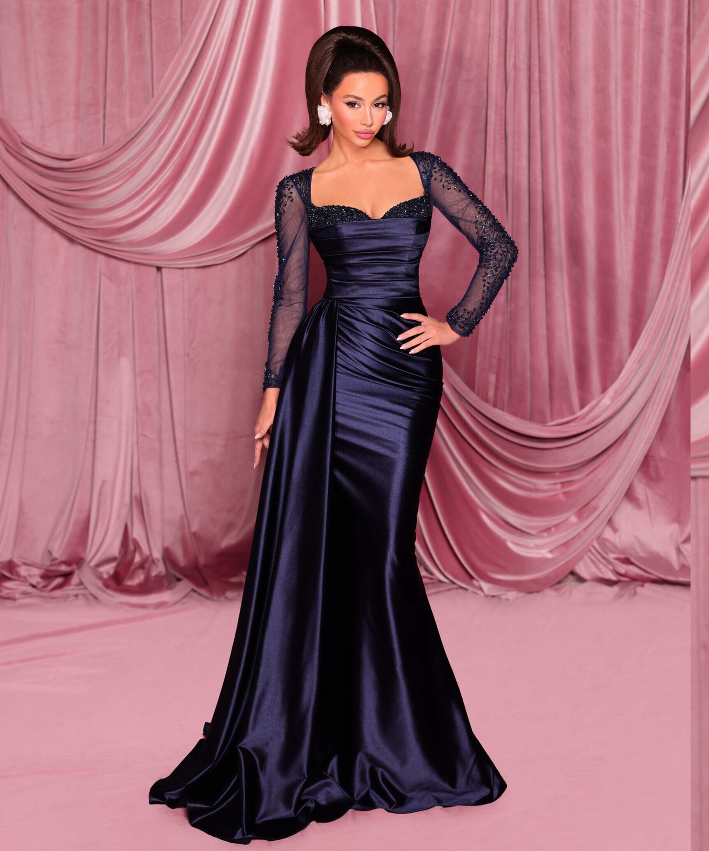 Shop Nicoletta NC3078 long sleeve embellished evening gown with sweetheart bodice and draped waist. Perfect for formal evening occasions.  Model is wearing the color Midnight.  Front View.