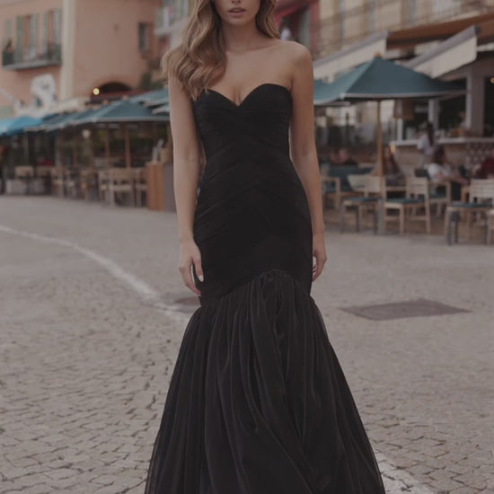Sherri Hill 57074 strapless mermaid metallic mesh gown with a skirt slit in black, perfect for formal evenings or prom.