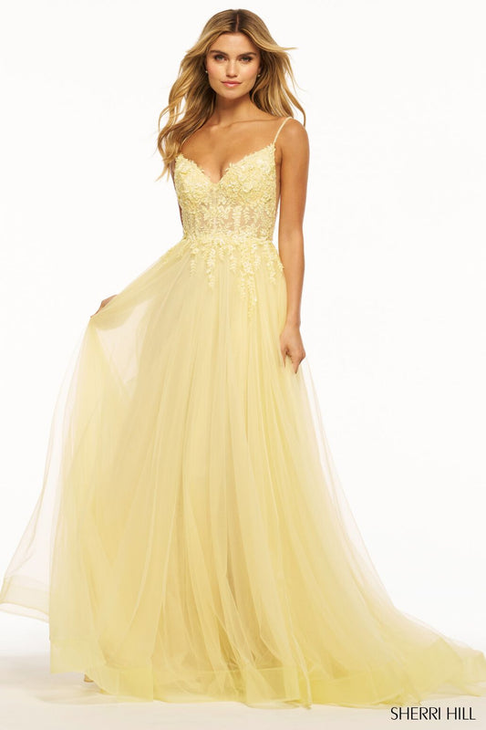 The Sherri Hill Lace Bodice Tulle A-Line Gown, a vision of timeless elegance with delicate lace, a flowing tulle skirt, and a lace-up back. Perfect for proms and formal occasions.