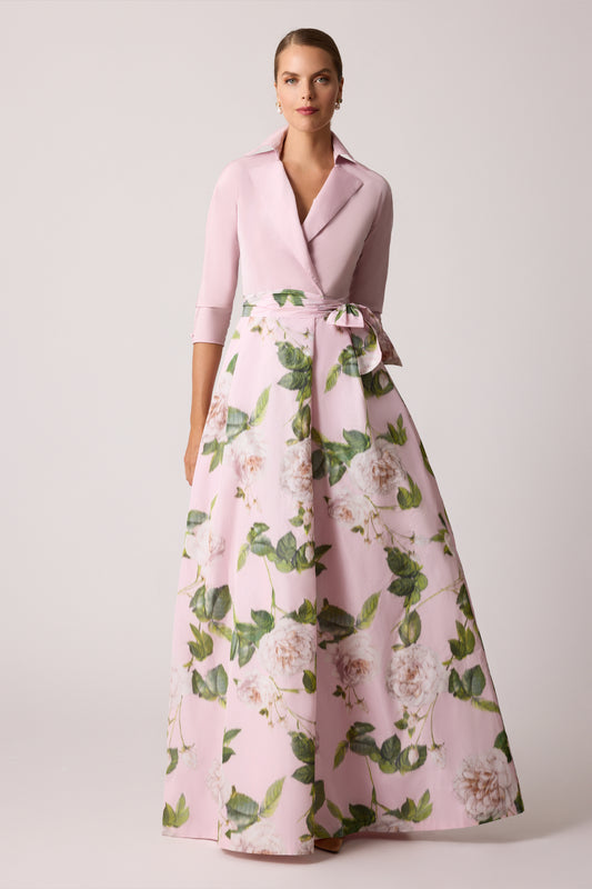 Model wearing Teri Jon 259018 gown with collared neckline, floral taffeta skirt, and sash belt.  Color Blush Multi.