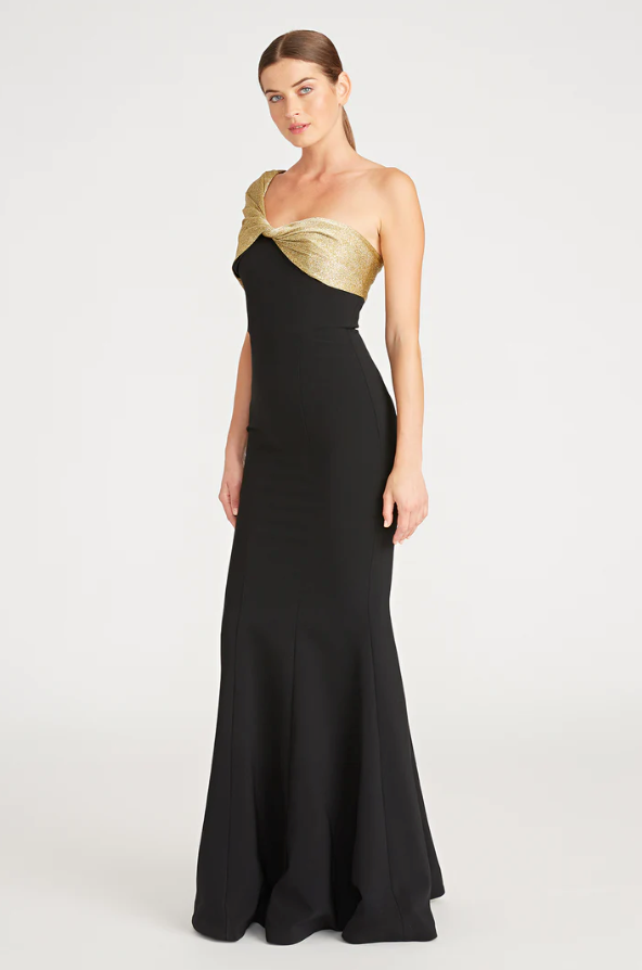 Theia 8818850 Asymmetric Neck Fit and Flare Gown, a floor-length dress with an asymmetric neckline and sleeve, draped bodice, ideal for special occasions and mothers of the bride or groom.